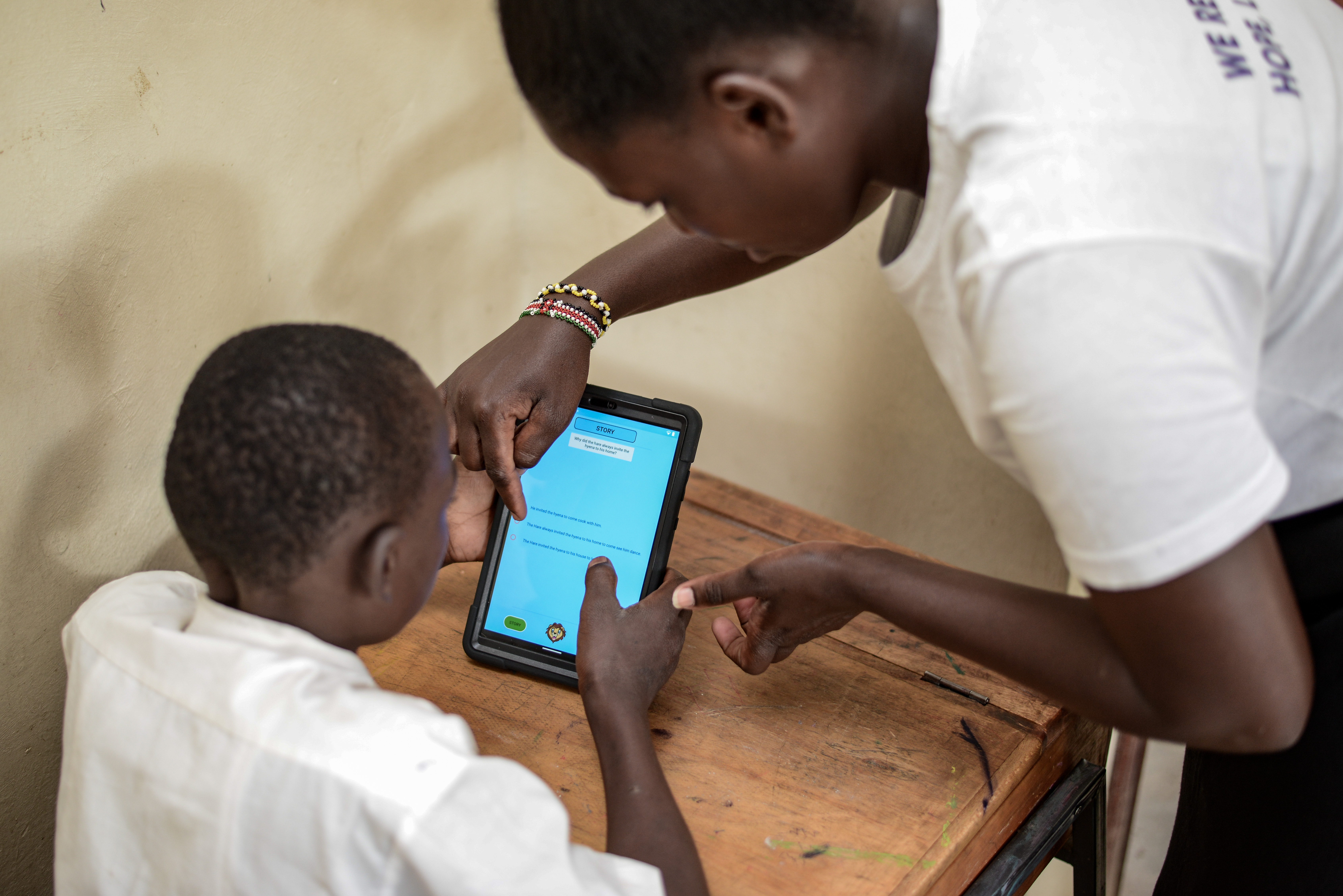 Teacher in classroom with students